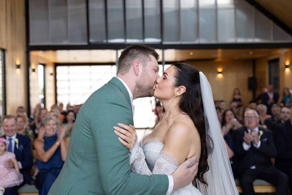Kylie & Sam in the defining frame of their wedding at Zonzo Estate