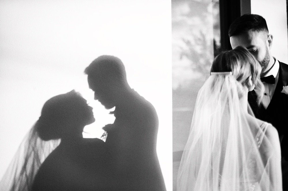 Side-by-side black and white photos of a couple at their wedding. The left photo shows their silhouette with a close-up of their faces looking at each other. The right photo shows them in an embrace, with the bride's veil and the groom in a tuxedo vi