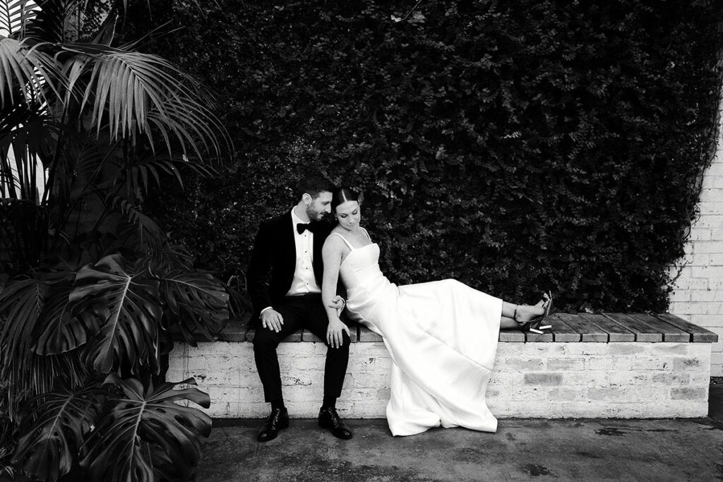 Georgia & Josh in the defining frame of their wedding at The Button Factory