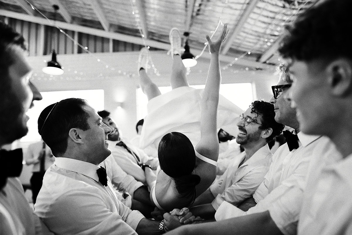 A moment from Hora Dance with Georgia & Josh's wedding story at The Button Factory