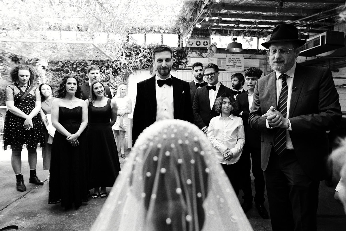 A moment from Georgia & Josh's wedding story at The Button Factory, story image 10