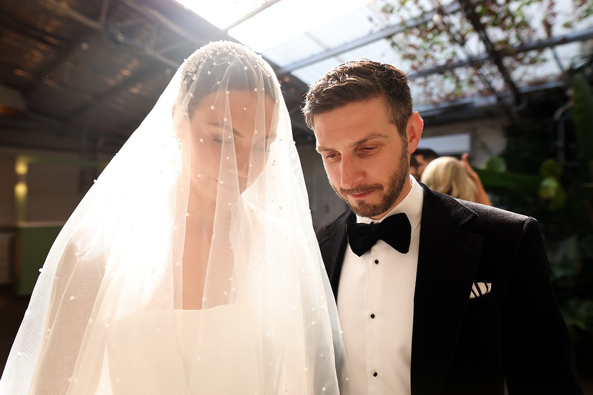 A moment from Georgia & Josh's wedding story at The Button Factory, story image 11