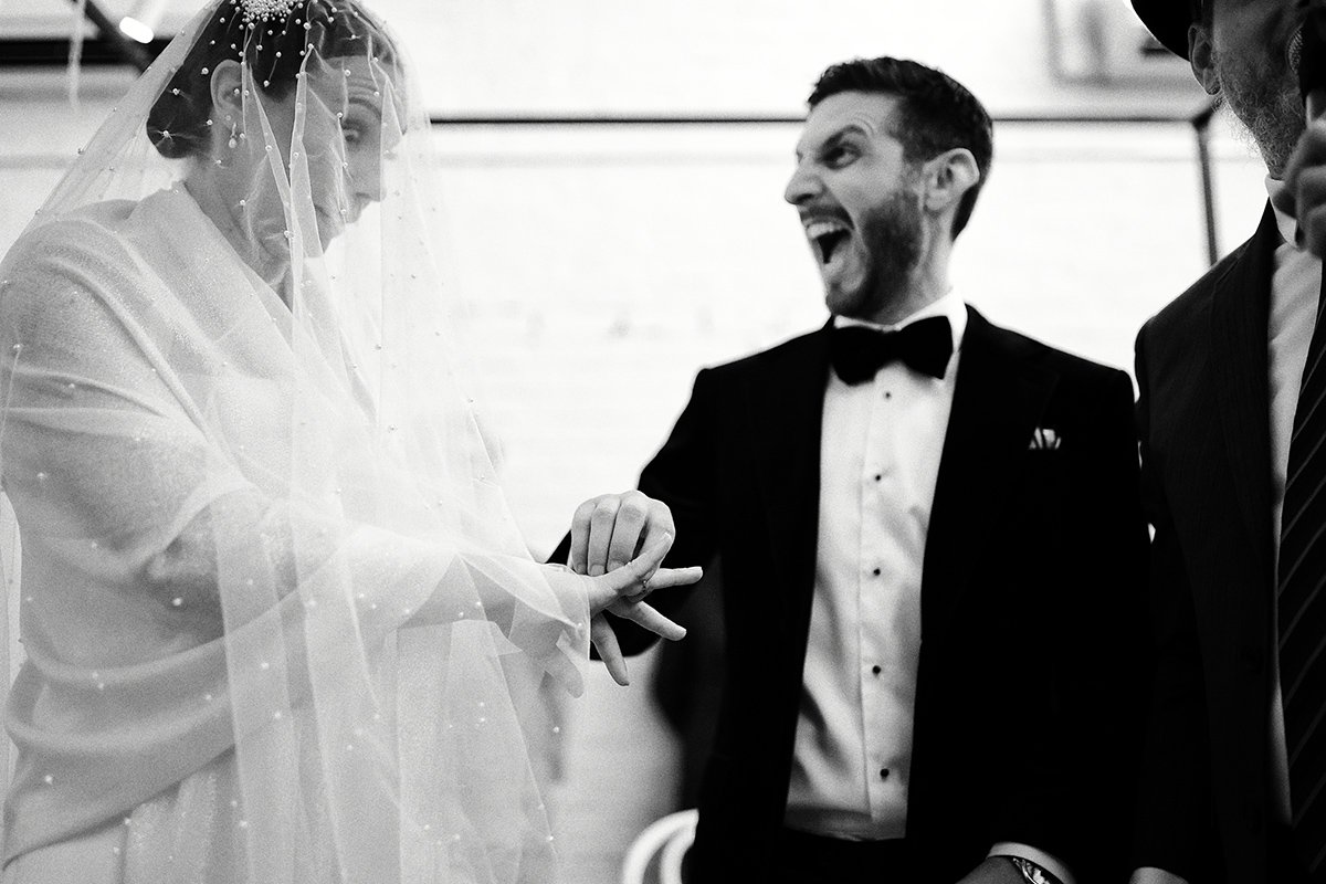 A moment from Georgia & Josh's wedding story at The Button Factory, story image 12