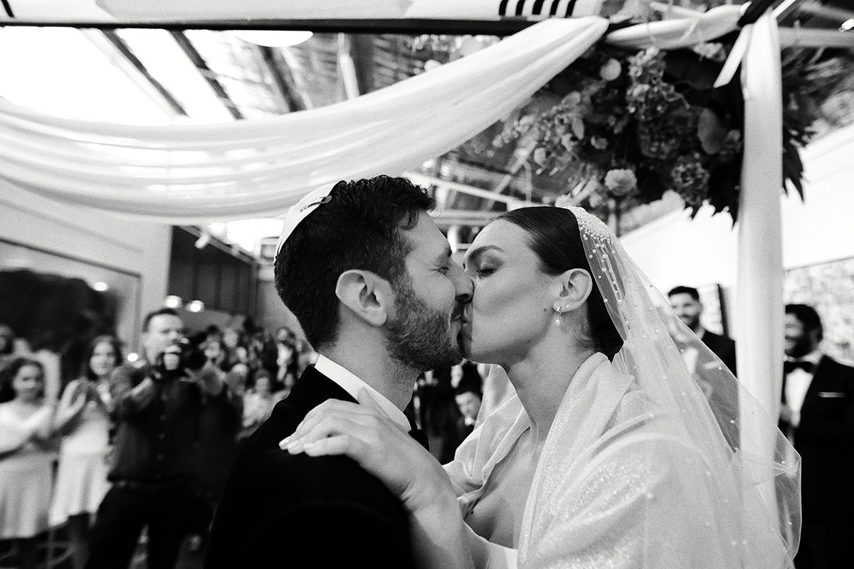 A moment from Georgia & Josh's wedding story at The Button Factory, story image 13