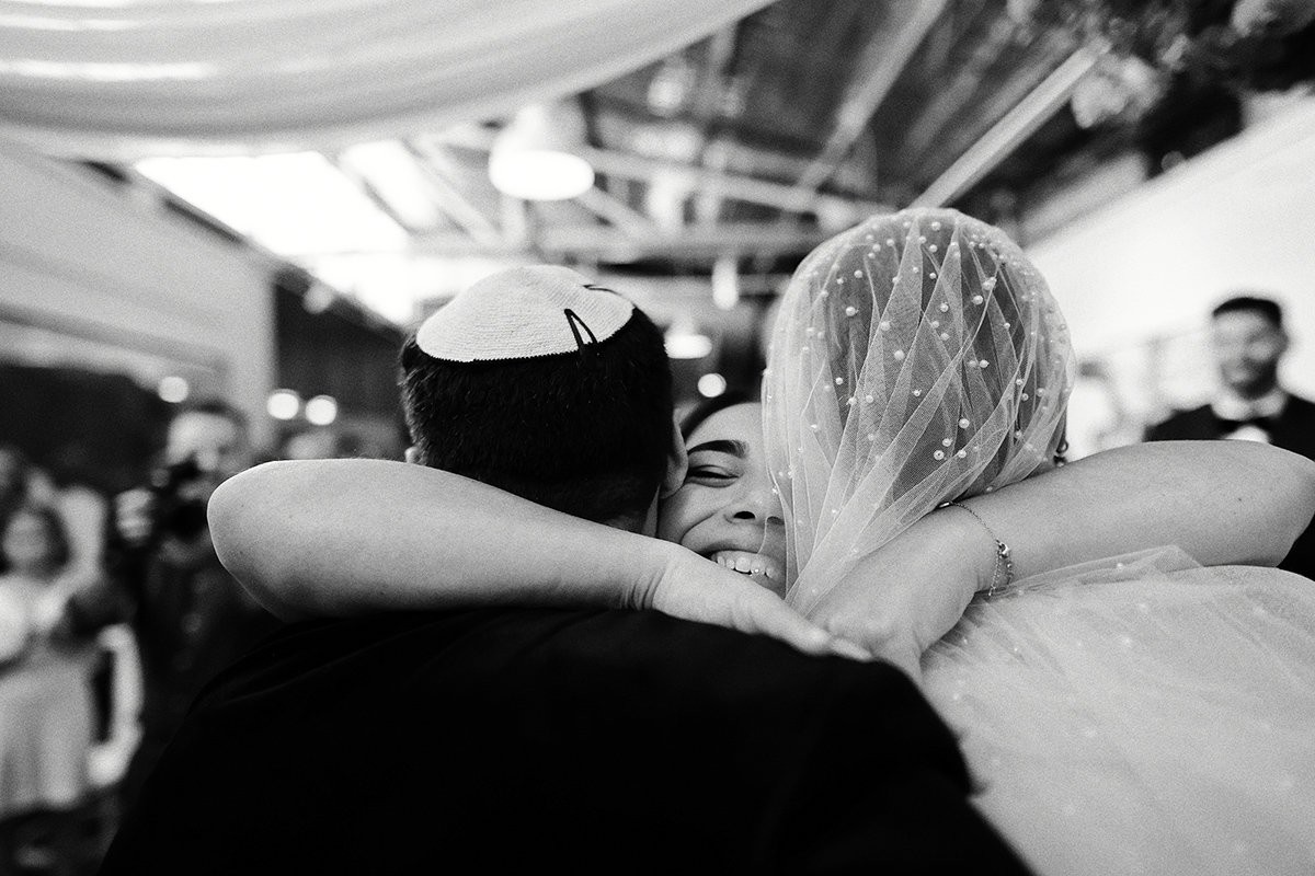 A moment from Georgia & Josh's wedding story at The Button Factory, story image 14