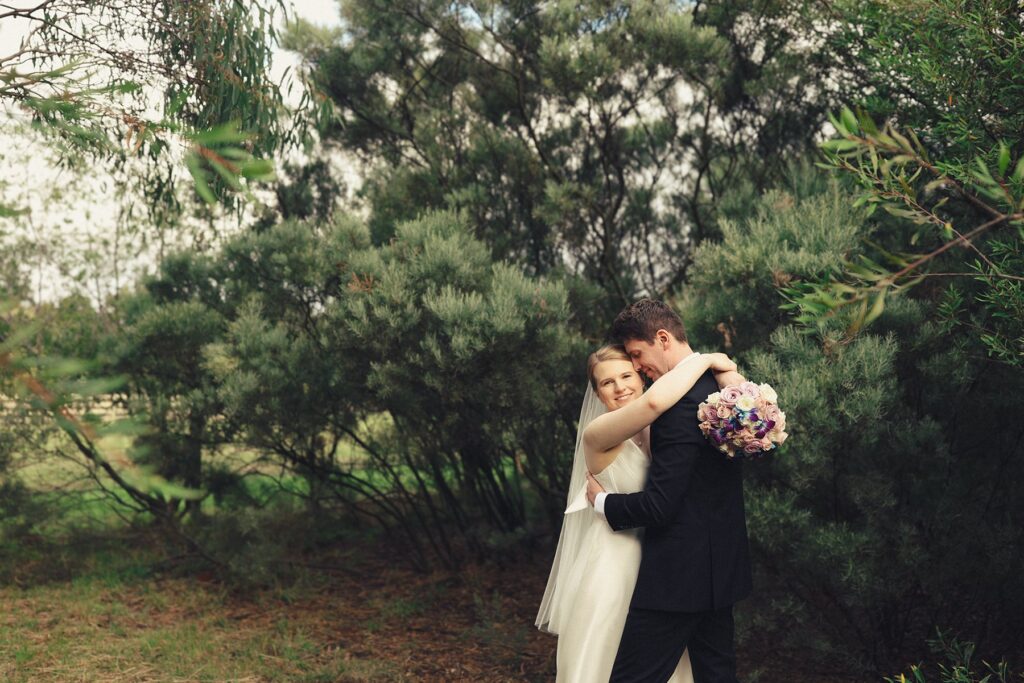 Amy & Alec in the defining frame of their wedding at at home