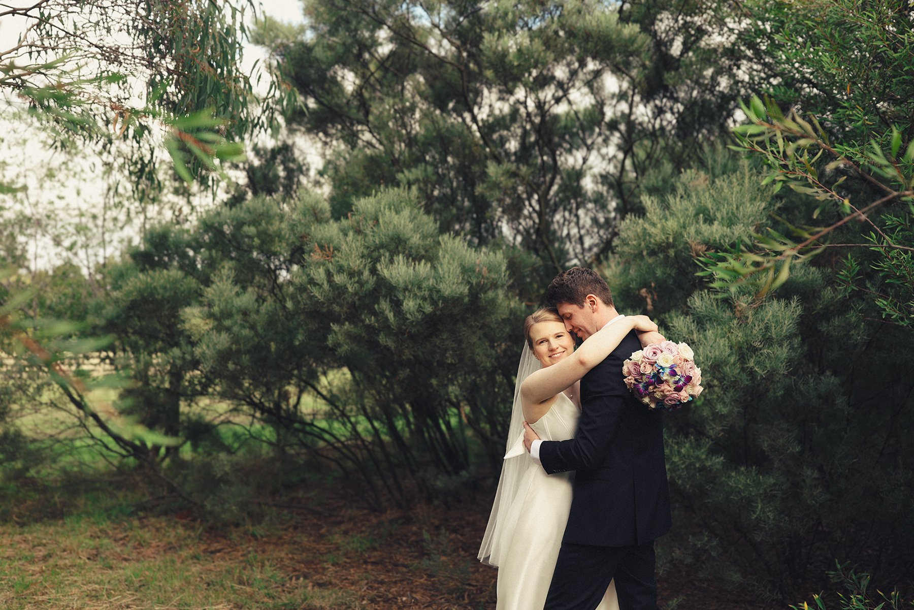 Amy & Alec in the defining frame of their wedding at at home