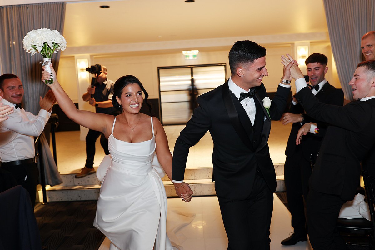 A moment from Kate & Nicholas's wedding story at San Remo Ballroom, story image 18